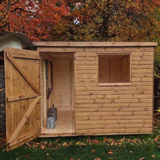 Timber shed with its ledged door open